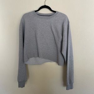 Cropped grey crew neck sweater